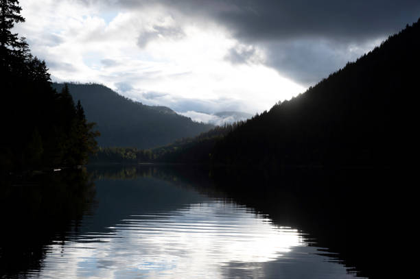 istock Sunset over a mountain Lake 1363309393