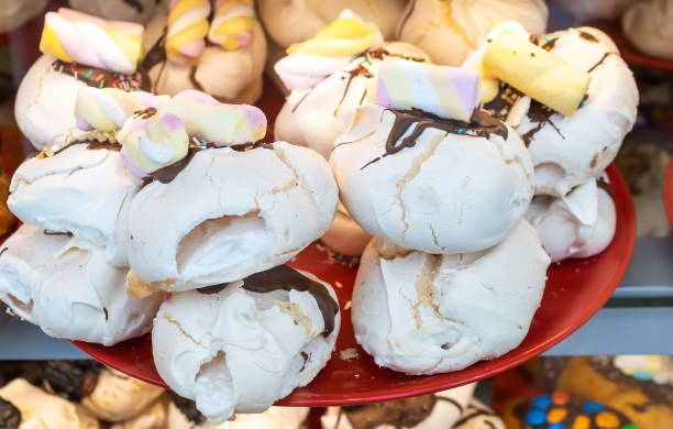 istock meringue cookies in a shop window. background 1363318063