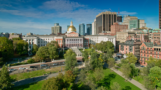 Aerial shot of the Massachusetts State House overlooking Boston Common on a sunny day in early Fall. 

Authorization was obtained from the FAA for this operation in restricted airspace.