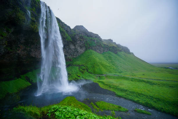 various shots of Seljalandsfoss waterfall in Iceland