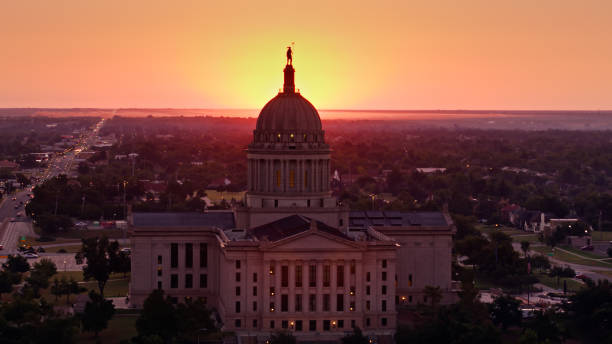 istock Sun Rising Behind Oklahoma State Capitol Dome - Aerial 1363328225