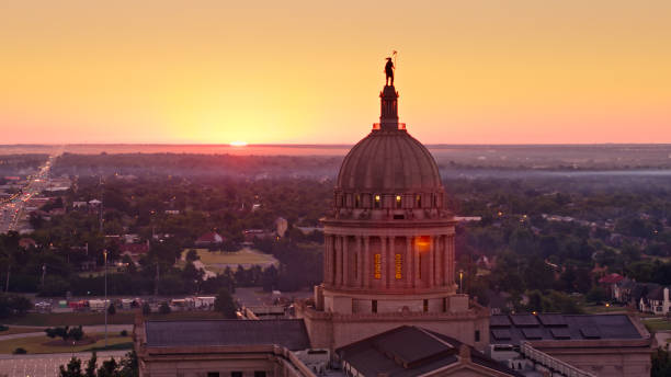 istock Oklahoma State Capitol Building with Sun Rising Behind - Aerial 1363328226