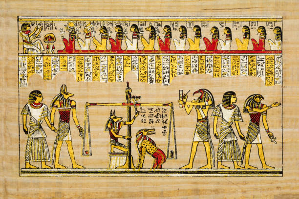 istock Old Egyptian papyrus with elements of ancient Egyptian history 1363332442