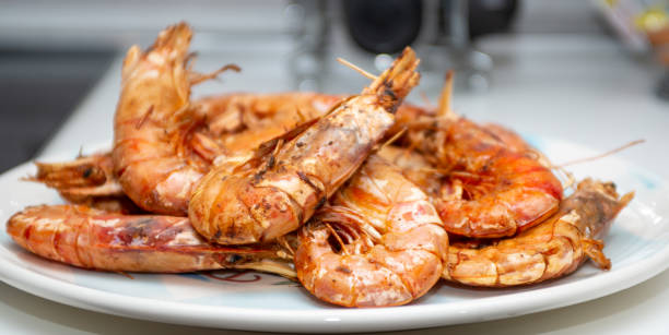 istock fried king prawns on plate closeup 1363333933