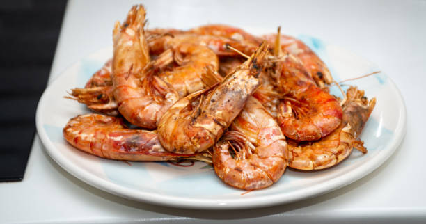 istock fried king prawns on plate closeup 1363334010