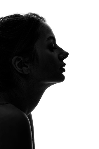 Silhouette of a profile of a young woman's face