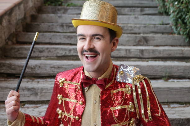 istock The greatest illusionist ever holding magic wand 1363334844