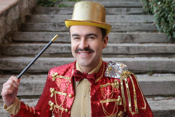 istock The greatest illusionist ever holding magic wand 1363334848