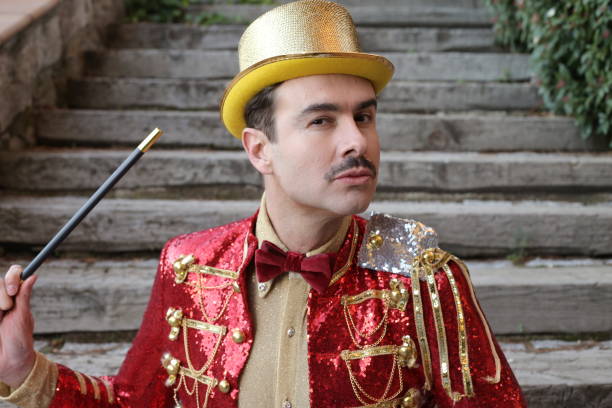 istock The greatest illusionist ever holding magic wand 1363334849