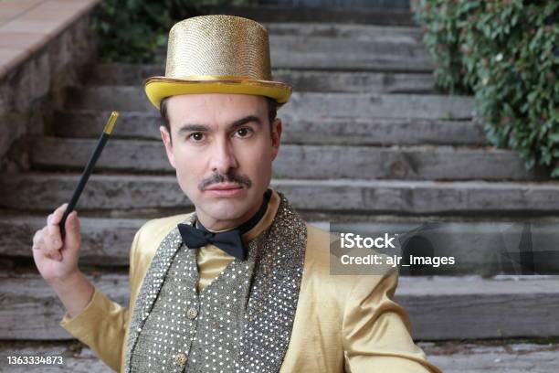 The Greatest Illusionist Ever Holding Magic Wand Stock Photo - Download Image Now - Magic Trick, Mustache, Circus