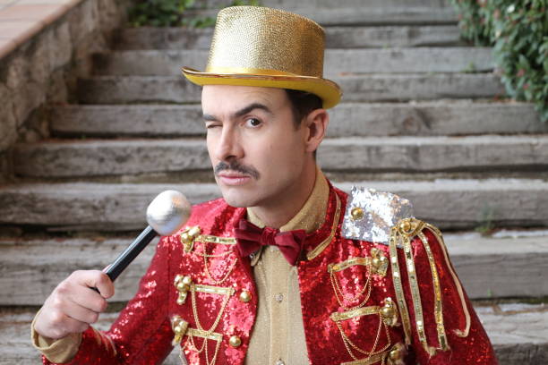 Elegant host wearing flashy outfit holding a microphone