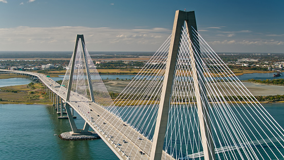 Drone shot of the Cooper River Bridge, officially the Arthur Ravenel Jr. Bridge, a cable-stayed bridge over the Cooper River in South Carolina, US, connecting downtown Charleston to Mount Pleasant.