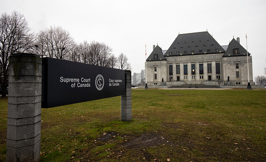 Ottawa, Ontario, Canada - November 25, 2021:  Supreme Court of Canada building in the rain.