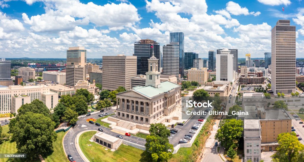 Aerial view of Nashville Capitol and skyline Aerial view of Nashville Capitol and skyline on a sunny day. Nashville is the capital and most populous city of Tennessee, and a major center for the music industry Nashville Stock Photo