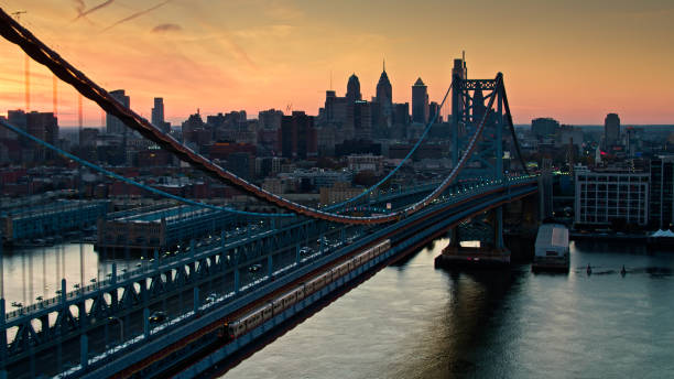 istock PATCO Train Headed Into Philadelphia at Sunset - Aerial 1363347998