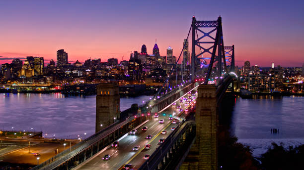 istock Drone Shot of Rush Hour Traffic on Ben Franklin Bridge at Nightfall 1363348034