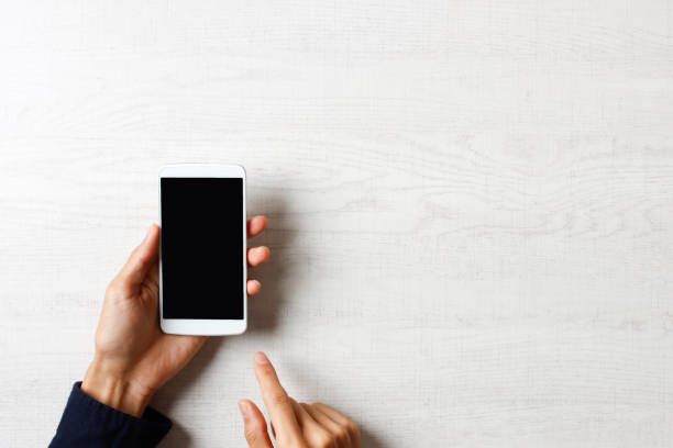 istock Hand of person showing smartphone screen 1363351845
