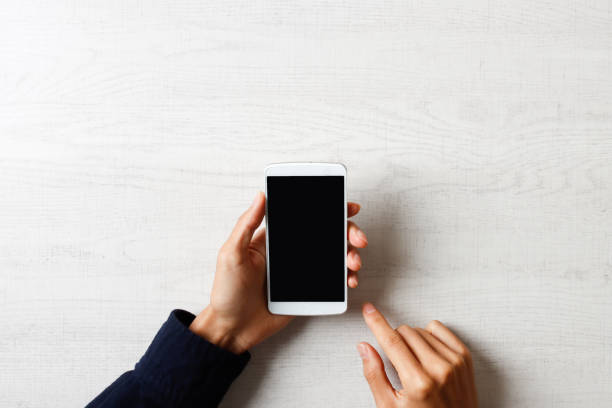 istock Hand of person showing smartphone screen 1363352097