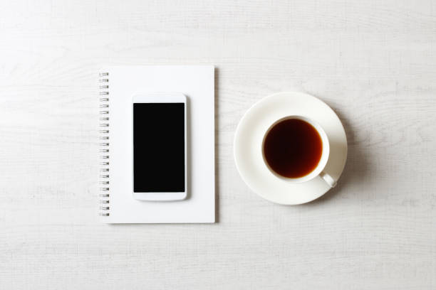 istock Coffee and business items placed on white background 1363352298