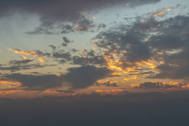 istock Beautiful sunset sky above clouds with dramatic light, Beautiful blazing sunset landscape, Copy space, Selective focus. 1363352741