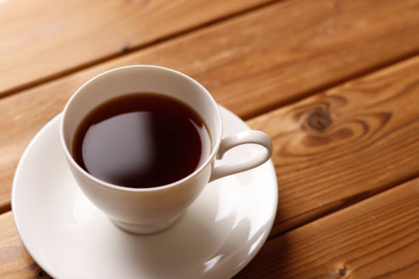 istock Delicious coffee and wood background 1363352792