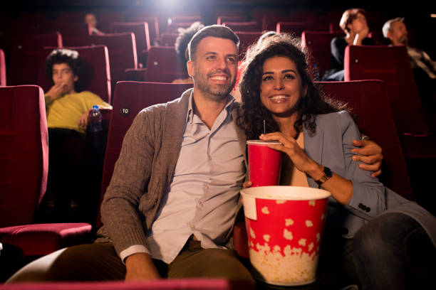 istock Happy couple having a date at the cinema 1363352829