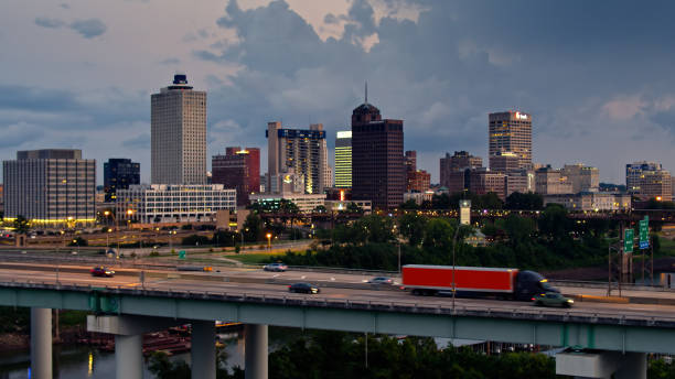 istock Truck Passing Downtown Memphis on Stormy Evening 1363353434