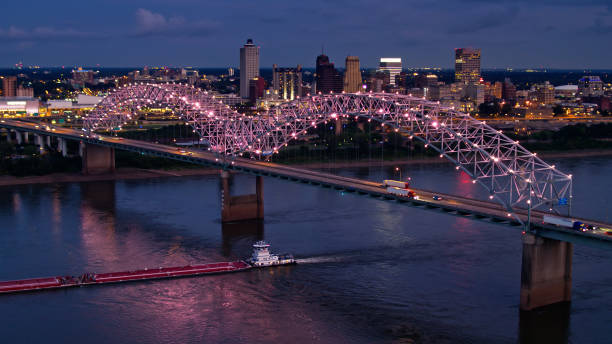 istock Barge Passing Under Hernando de Soto Bridge with Memphis Skyline in Background 1363353441