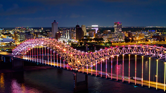 Aerial shot of the spectacular light show on the Hernando de Soto Bridge, which carries Interstate 40 across the Mississippi between Tennessee and Arkansas, with downtown Memphis in the background.