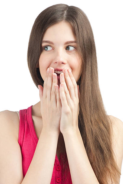istock Surprised girl covering her mouth 136335380