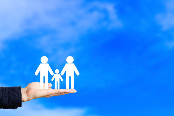istock Family of three and blue sky background 1363353868