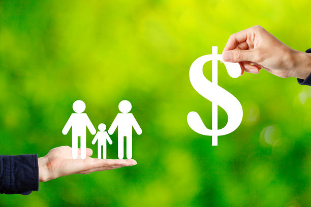 istock Dollar and family of three 1363353874