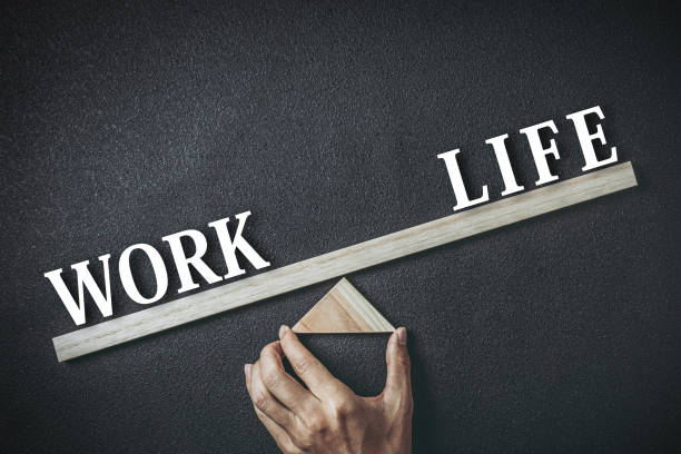 istock Work and life seesaw balance 1363353940