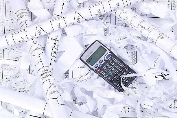 istock Calculator and waste paper 136335547
