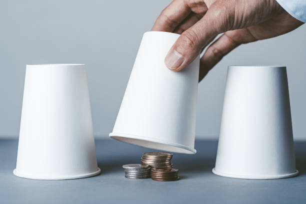 istock White paper cup and Japanese coins 1363357444