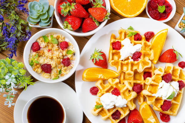 istock Delicious waffle dessert with fruits 1363361932