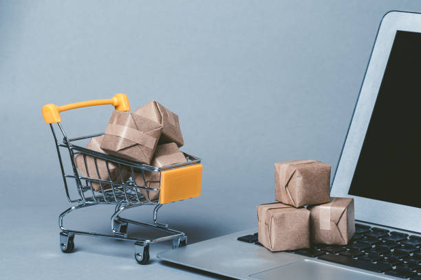istock Miniature Cardboard Shopping Cart and Internet 1363362807