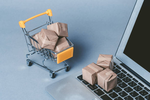 istock Miniature Cardboard Shopping Cart and Internet 1363362811