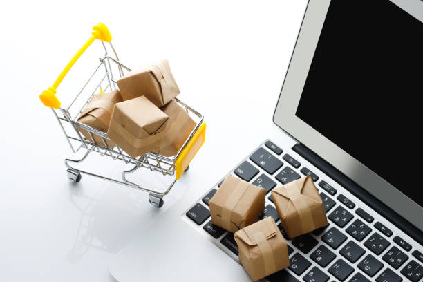 istock Miniature Cardboard Shopping Cart and Internet 1363362812