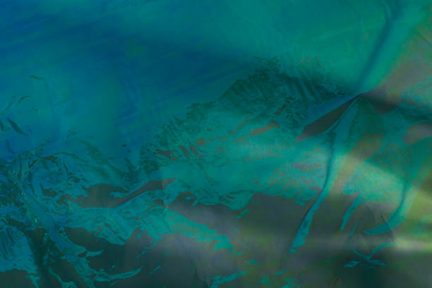 istock Blue, purple and teal iridescent lighting background texture 1363364364