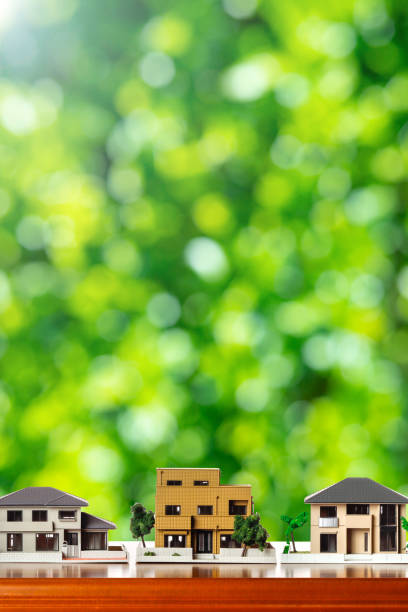 istock House model and green blur background 1363365215