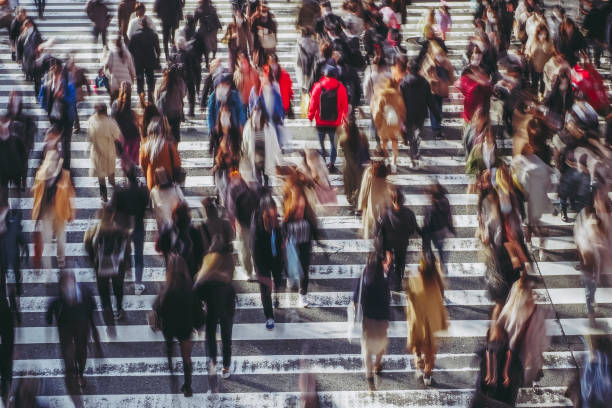 istock People crossing the pedestrian crossing in Osaka 1363367622
