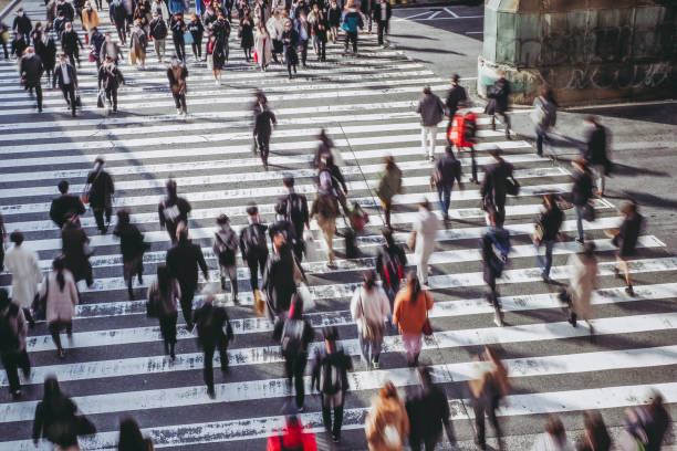 istock People crossing the pedestrian crossing in Osaka 1363367624