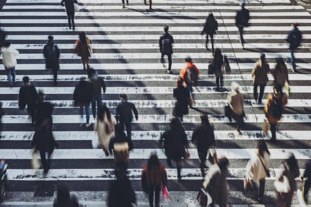 istock People crossing the pedestrian crossing in Osaka 1363368142