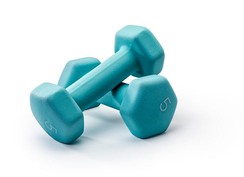 This is a close up photo in the studio of women's 5lb dumbells on a white background
