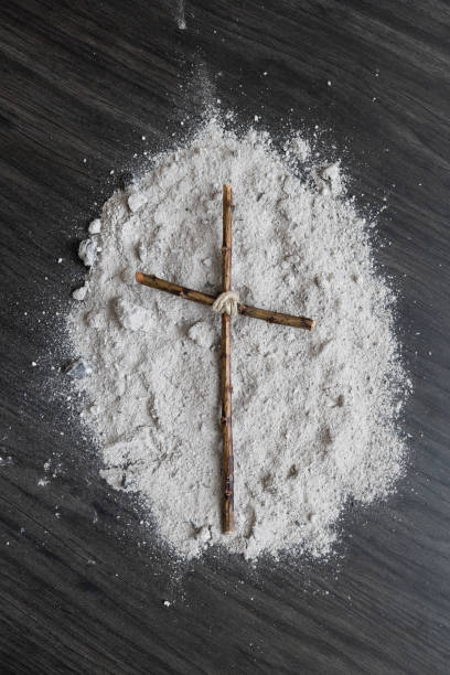istock wood cross on ashes 1363375274