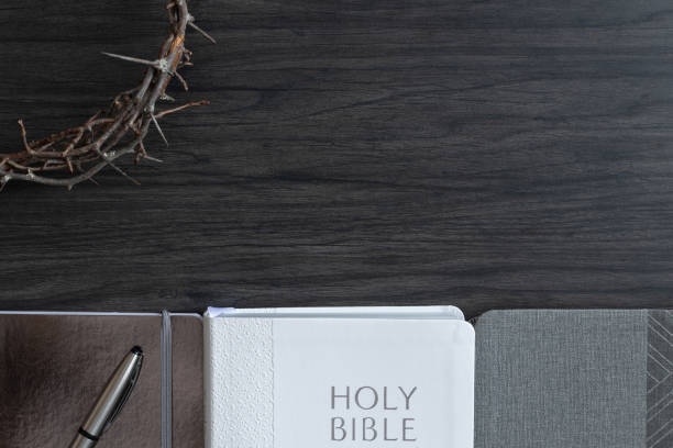 istock Bible, journals and crown of thorns 1363375339