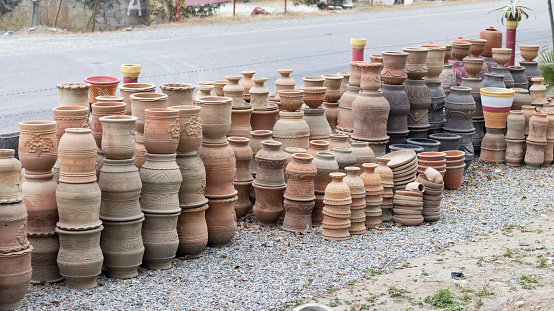 New flowerpot are display on a roadside for sale