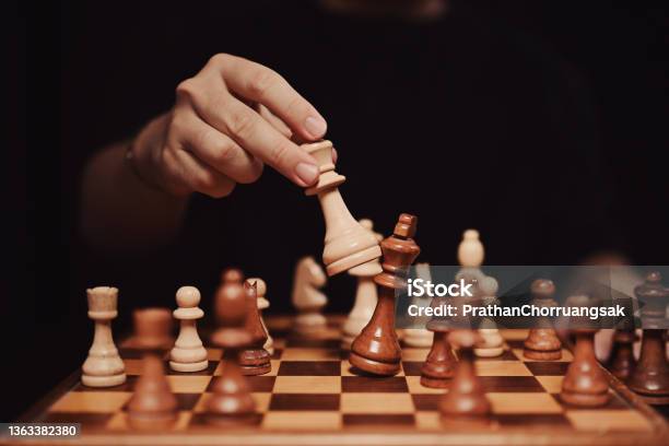 Successful Business Competition Concept Businessman Moving Chess Piece And Checkmate During Competition Stock Photo - Download Image Now