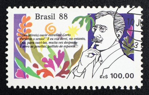 brazilian postage stamp, on black background. studio shot. 1988.